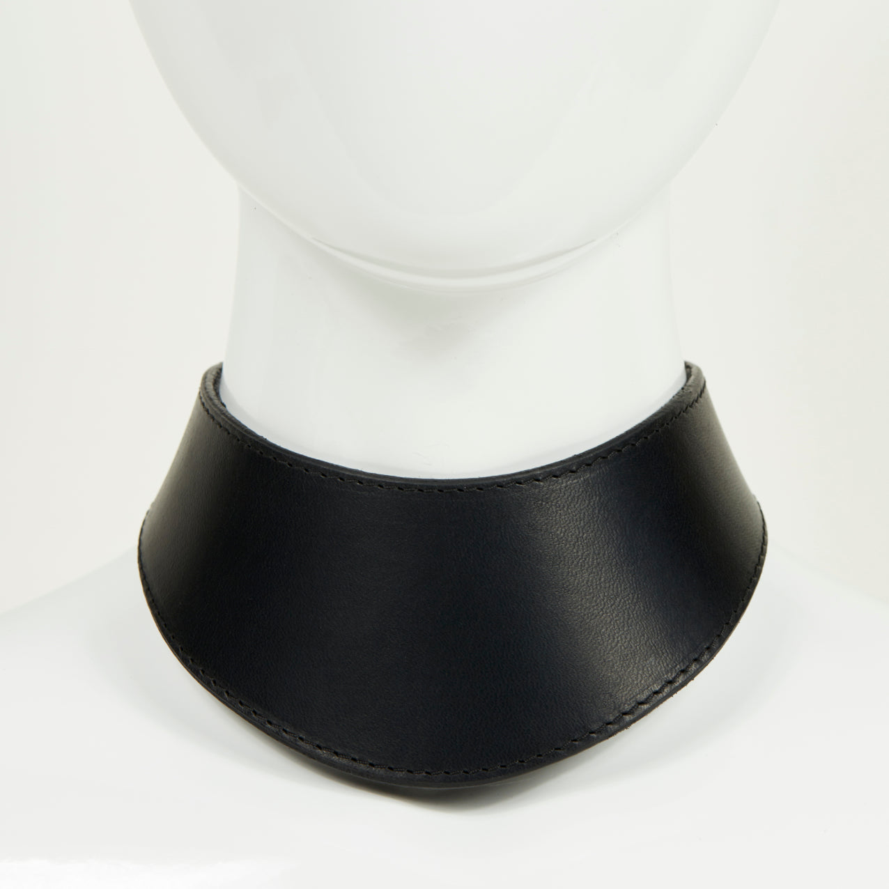PLAY COLLAR front view of wide, curved style collar in black leather with black stitched edges